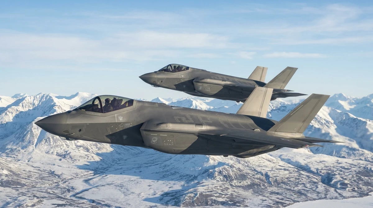 Illustration: two F-35A Lightning II fighters over snow-covered mountains