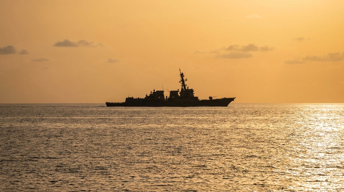 Illustration: guided-missile destroyer silhouetted at sea
