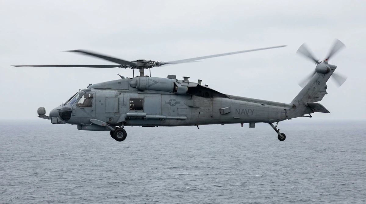 Illustration: US Navy MH-60S Seahawk helicopter in flight over open sea